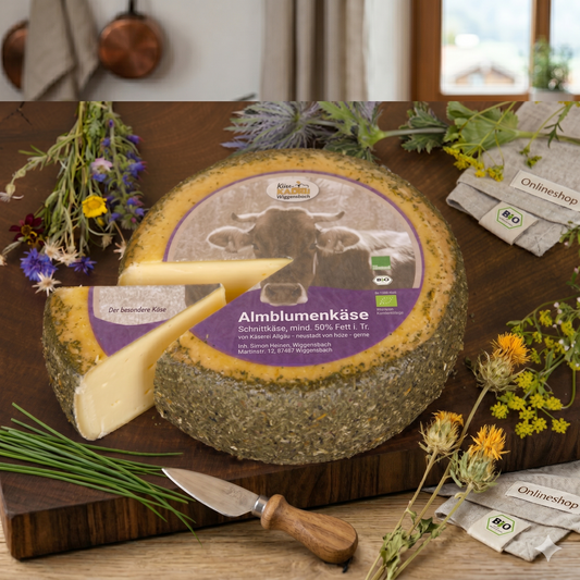 Almblumenkäse Bio-Schnittkäse aus Allgäuer Bio-Heumilch mit Wildkräuter-Rinde